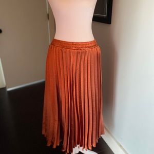 Copper pleated skirt